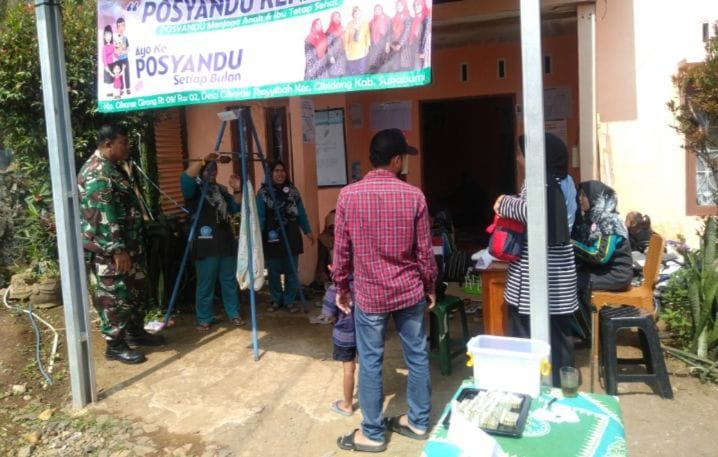 Babinsa Laksanakan Pendampingan Posyandu di Desa Cikarae Thoyibah
