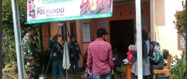 Babinsa Koramil 2204/Cikidang Laksanakan Pendampingan Kegiatan Posyandu di Desa Cikarae Thoyibah 4